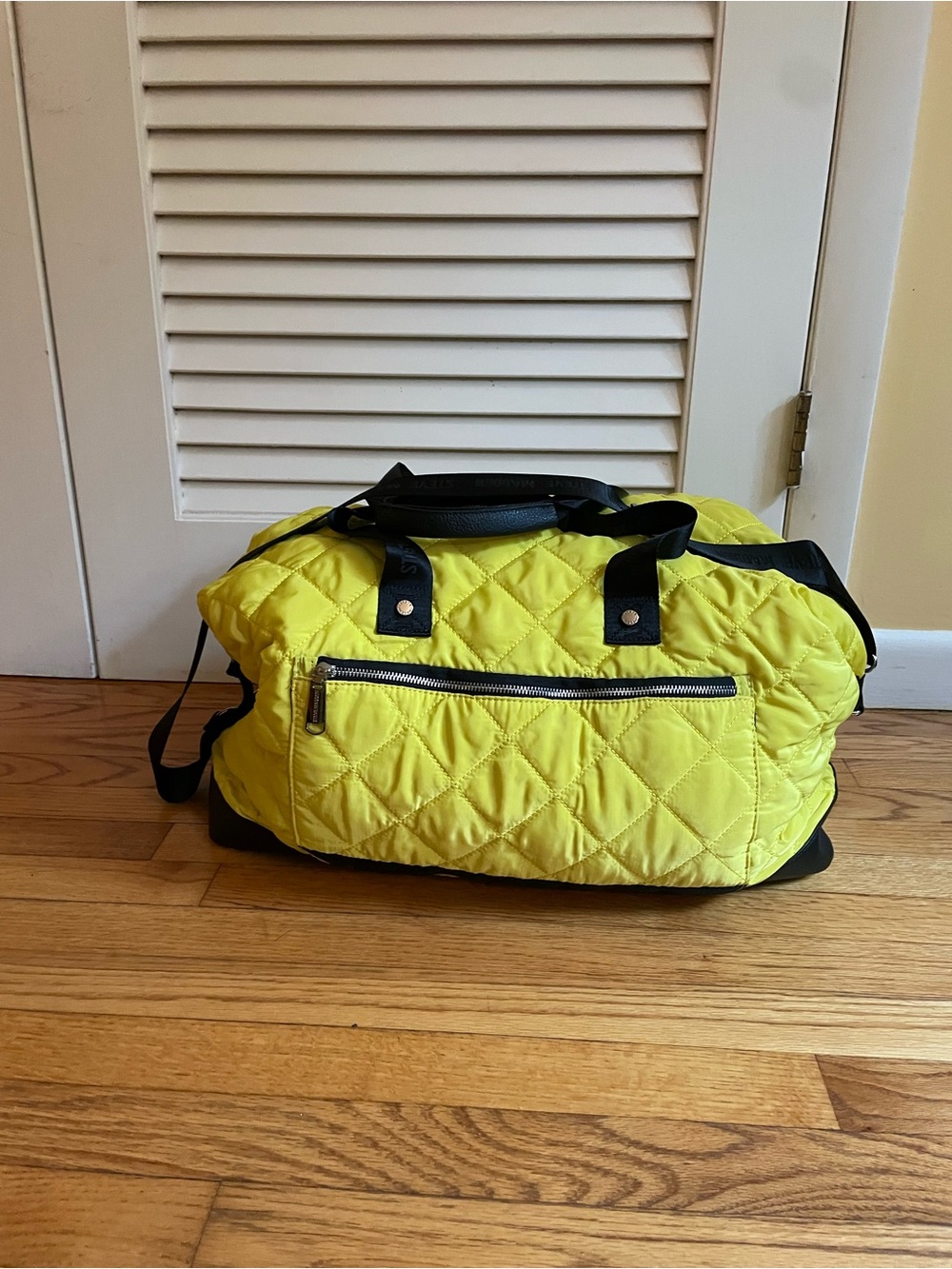 Quilted High-Visibility Yellow Duffel Bag with Black Accents